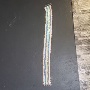 Pastel colored sequin belt
